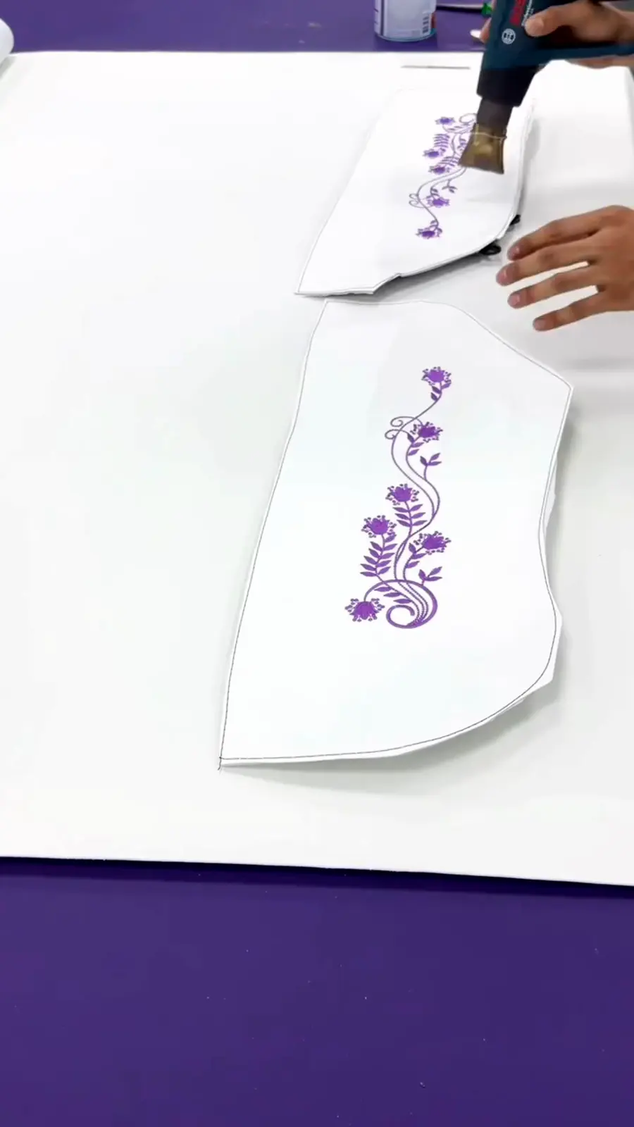 Embroidery — Bespoke monograms and motifs, stitched into upholstery and headlining.